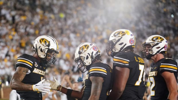 Missouri Tigers wide receiver Theo Wease Jr. (1) celebrates with wide receiver Luther Burden III (3) after Wease s touchdown against the Middle Tennessee Blue Raiders during the second half at Faurot Field at Memorial Stadium. 